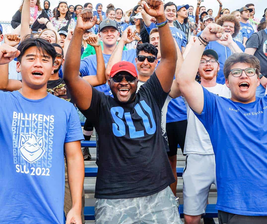 Students cheer at a soccer game