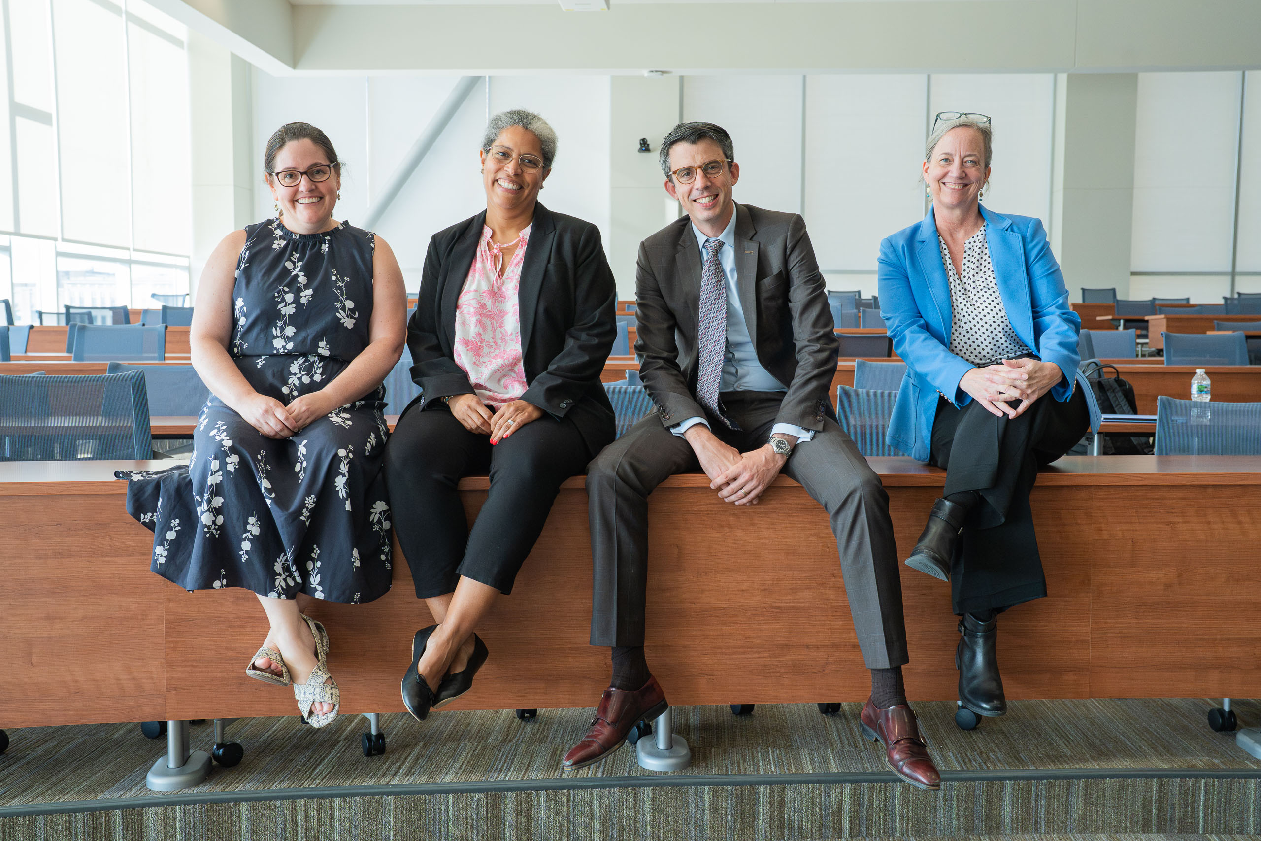 Legal clinics faculty sit in the courtroom