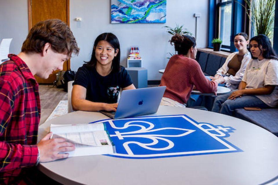Medical students collaborate in the Wellness Space at the School of Medicine.