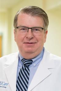 Headshot of Richard D. Bucholz