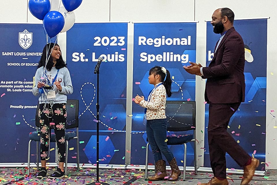 After more than two hours of intense competition, matching brainpower with perseverance and the occasional heartbreak, the 2023 regional Scripps Spelling Bee at Saint Louis University came down to one final contestant, with one final word: “drumlin.”  Sonia Kulkarni stepped up to the microphone and delivered each letter flawlessly. 