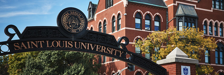 An arch that reads "Saint Louis University" located near Grand Blvd. on the University's campus