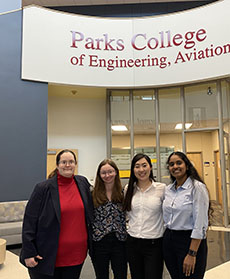 Kathleen Botterbush, Colleen McLaughlin, Ariana Monma, and Jahnavi Nadella posed in McDonnell Douglas Hall