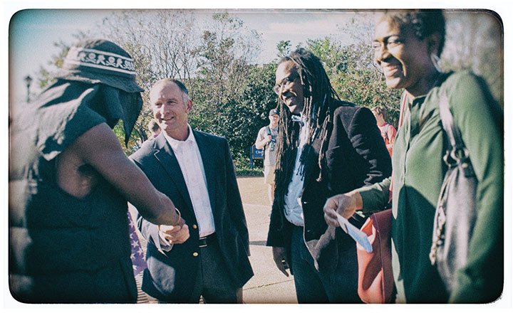 Jonathan Smith with activist and SLU administrators